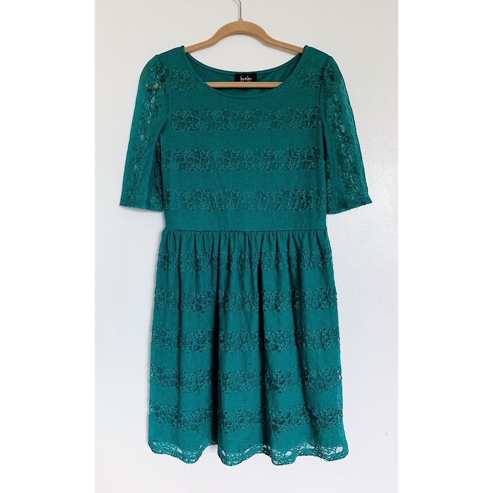 Adorable Green Lace mini dress.